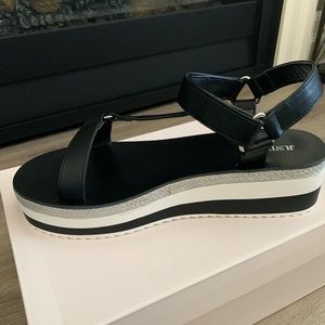 Anything Could Happen Platform Sandal